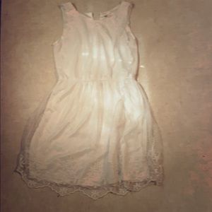 White dress with lace cover